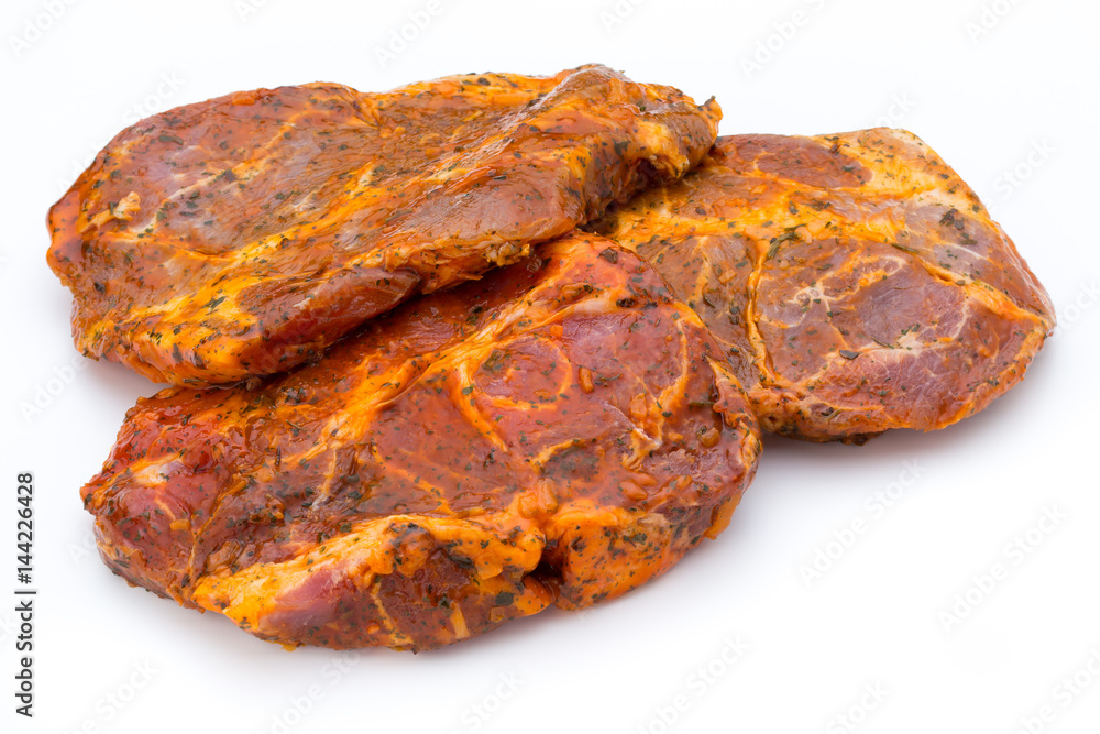 Pork chop, marinated. Isolated on the white background. Pork chop, marinated. Isolated on the white background.