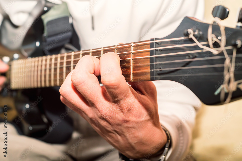 Fototapeta premium Man playing guitar