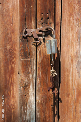 Old Rusty Latch on a Wooden Door