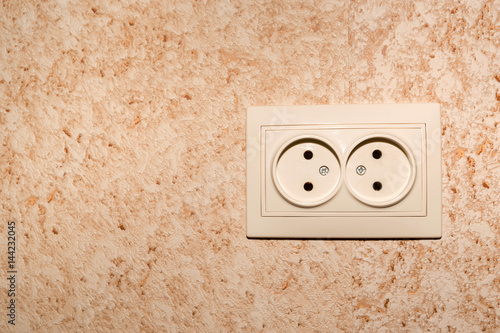 Electrical socket on a wall