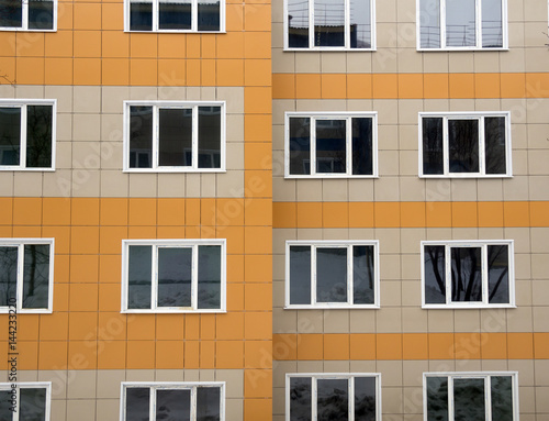 Fragment of a new house with ventilated facade made of ceramic tiles