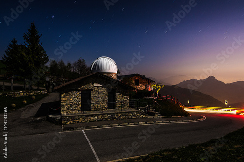Astronomical Observatory with auto wake and starry sky.