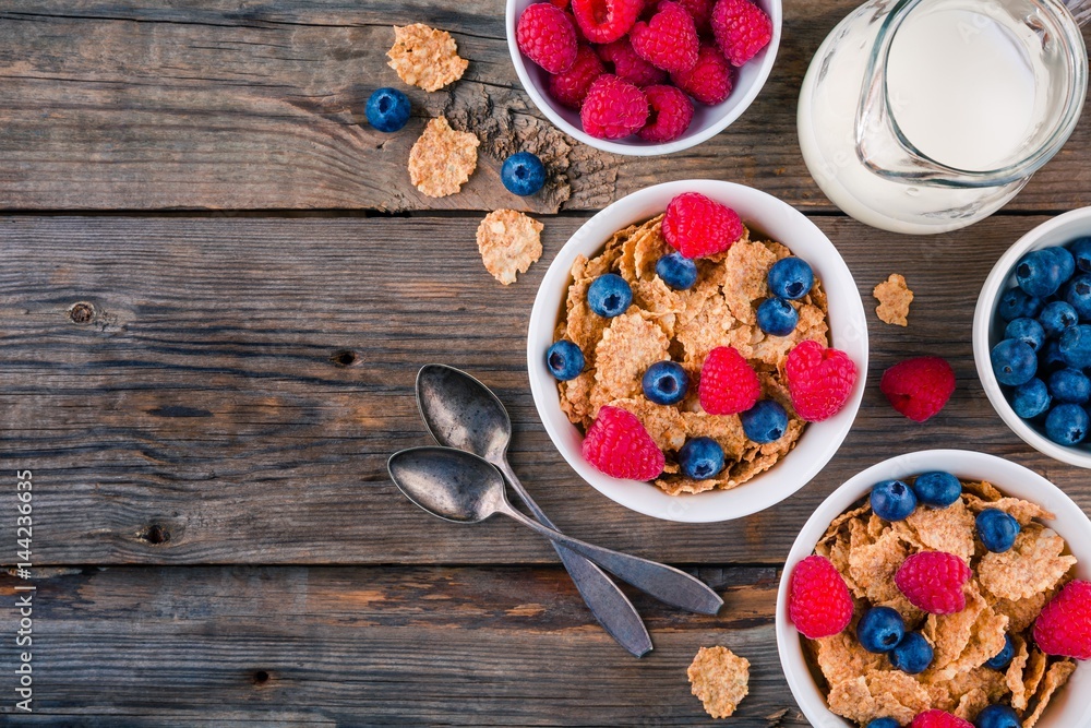 Healthy breakfast: whole grain cereal with raspberry and blueberry Healthy breakfast: whole grain cereal with raspberry and blueberry