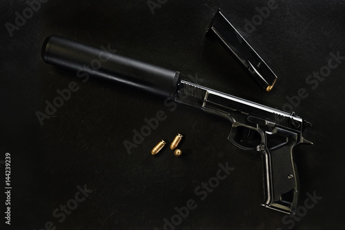 gun with a silencer photo