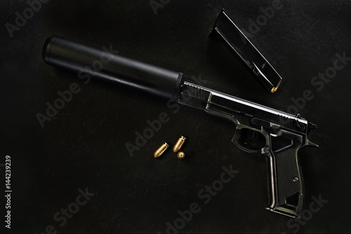 Quadro su tela gun with a silencer