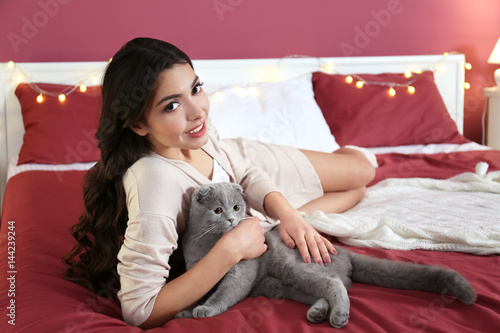 Beautiful young woman with ...