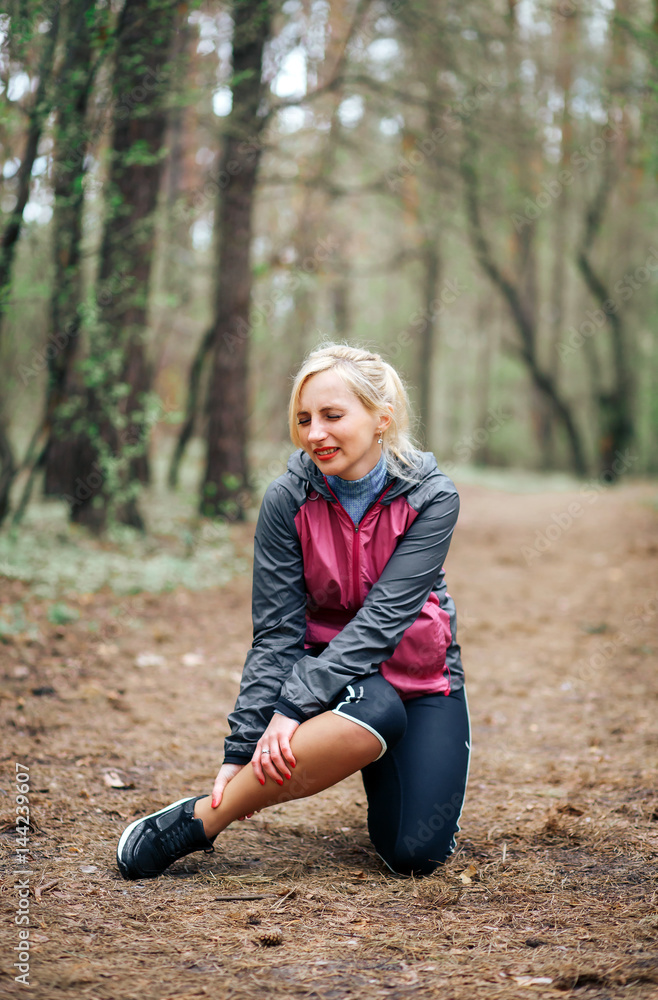 girl while Jogging through the woods injured his leg. The leg injury. girl while Jogging through the woods injured his leg. The leg injury.