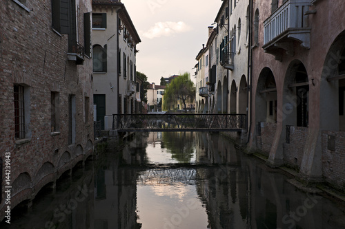 Reflections on Buranelli  canal at sunset in Treviso. Italy #144239843