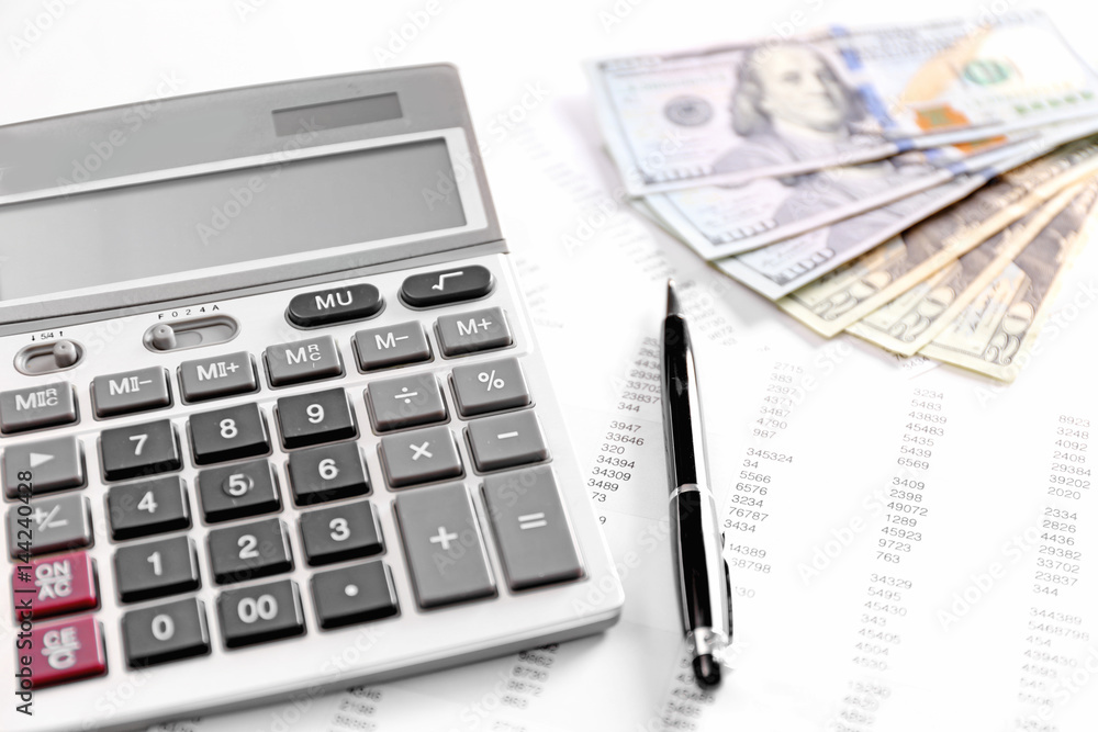 Health planning concept. Calculator, dollars and pen on bill background Health planning concept. Calculator, dollars and pen on bill background