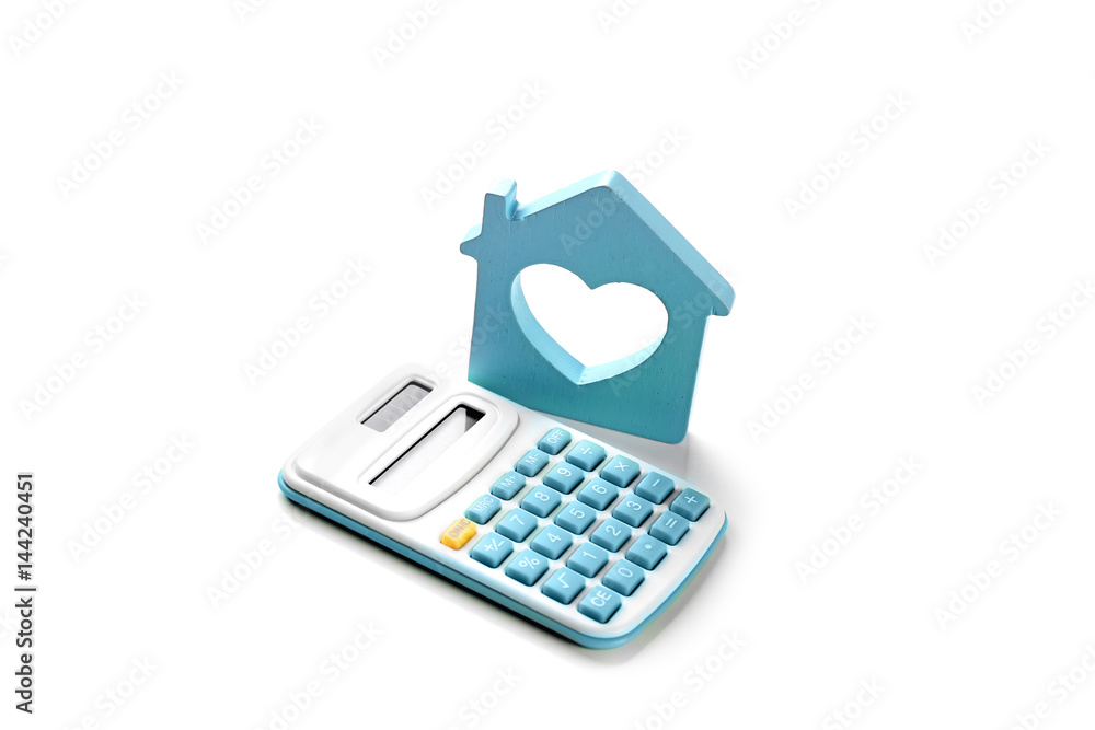 Life planning and health insurance concept. House figure with calculator on white background Life planning and health insurance concept. House figure with calculator on white background