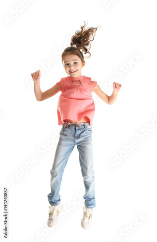 Cute little girl on white b...
