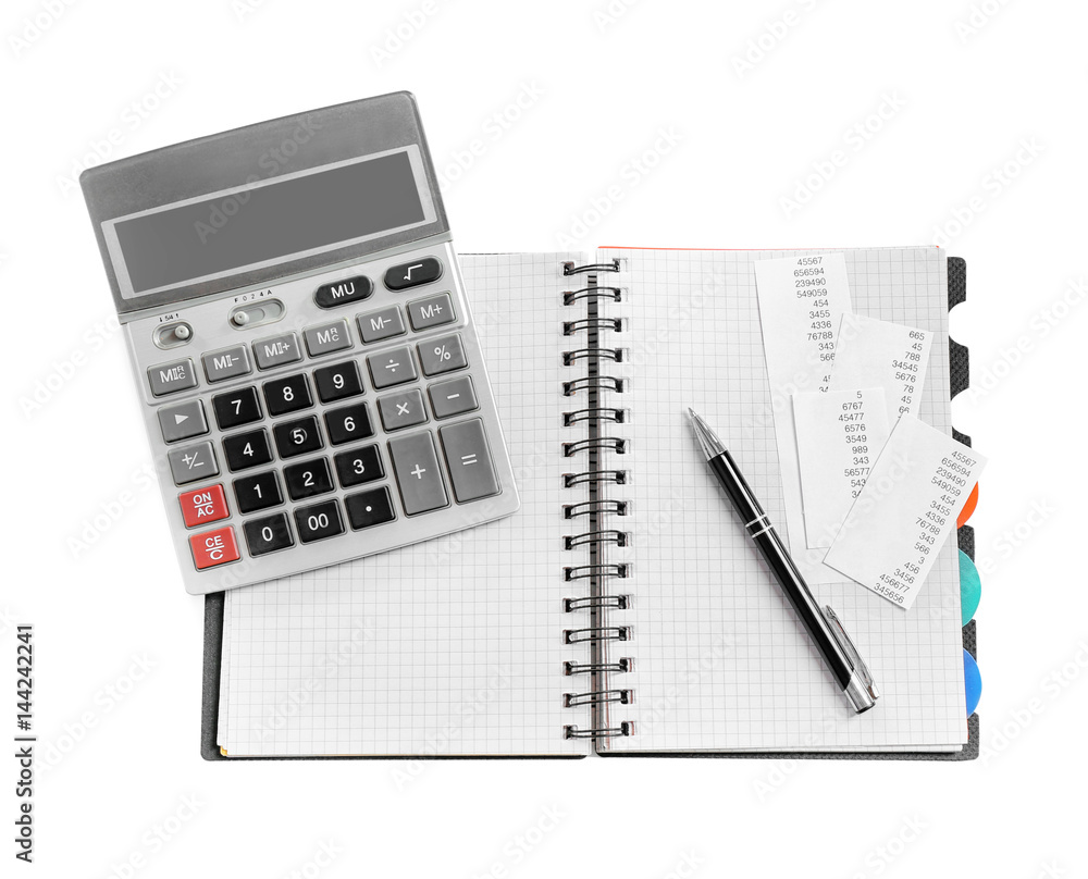 Gray calculator and notebook on white background Gray calculator and notebook on white background