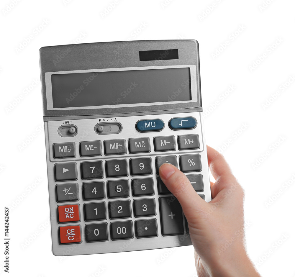 Female hand holding gray calculator on white background Female hand holding gray calculator on white background