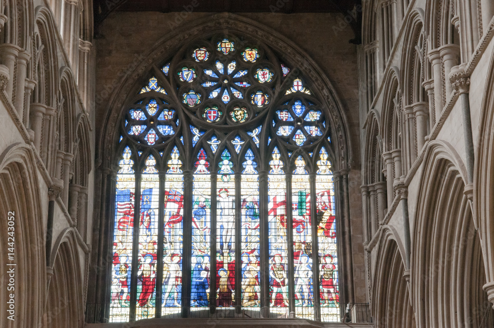 stained glass window of a cathedral in daylight stained glass window of a cathedral in daylight