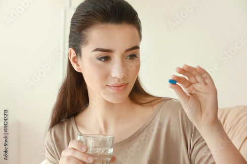 Beautiful young woman with ...