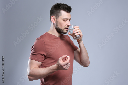 Handsome young man taking p...