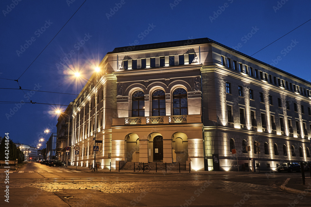 Building University Arts in Poznan by night .