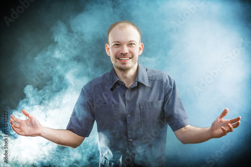young doctor smilling in smoke