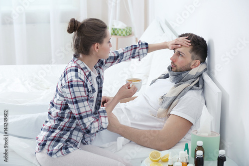 Young woman taking care of ...