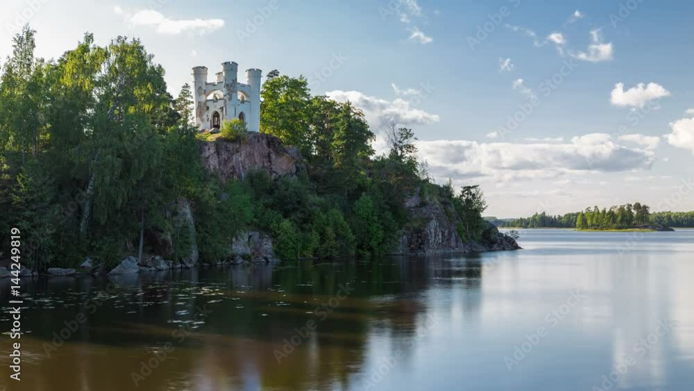 Timelapse of Chapel Ludwigsburg on a rocky island necropolis in the Zashchitnaya Bay, Northern nature, national historical architectural and natural museum reserve the Monrepos Park, Vyborg, Russia. Timelapse of Chapel Ludwigsburg on a rocky island necropolis in the Zashchitnaya Bay, Northern nature, national historical architectural and natural museum reserve the Monrepos Park, Vyborg, Russia.