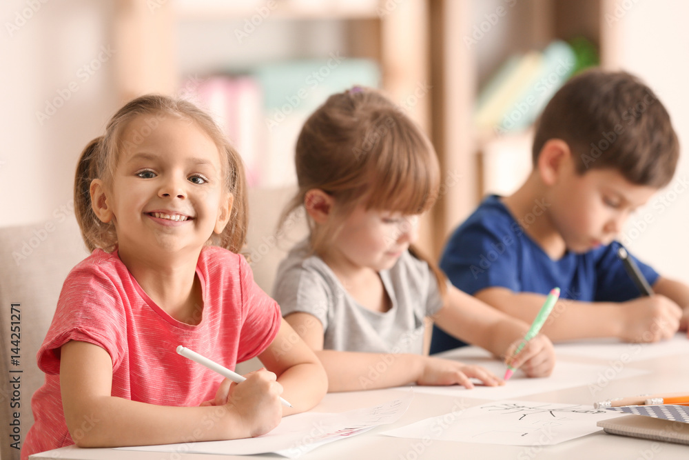 Cute kids drawing in classroom Cute kids drawing in classroom