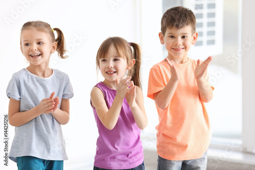 Cute kids singing in music ...