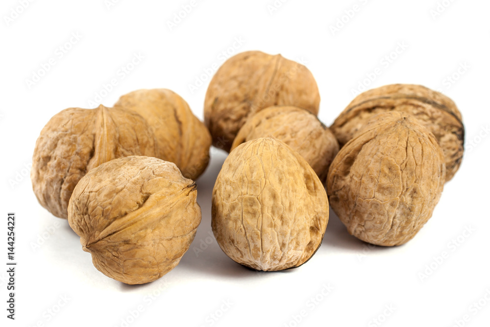 walnuts in shell isolated on white background walnuts in shell isolated on white background