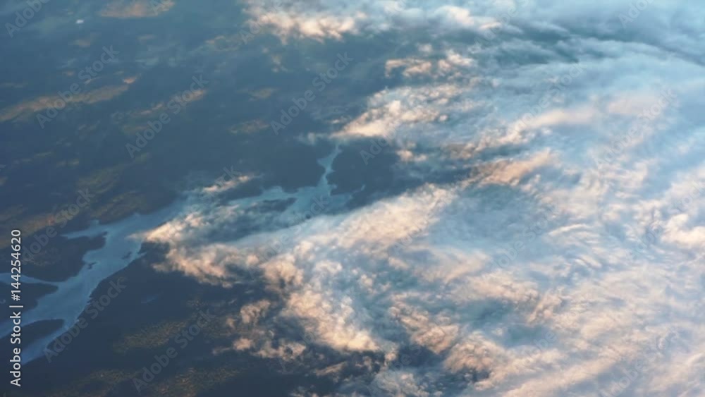 Beautiful aerial view of sunset cloud and sky from airplane Beautiful aerial view of sunset cloud and sky from airplane