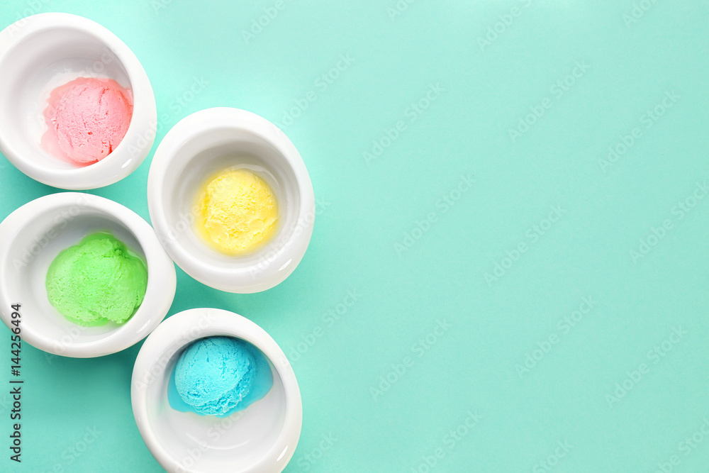 Ice cream collection in bowls on color background Ice cream collection in bowls on color background