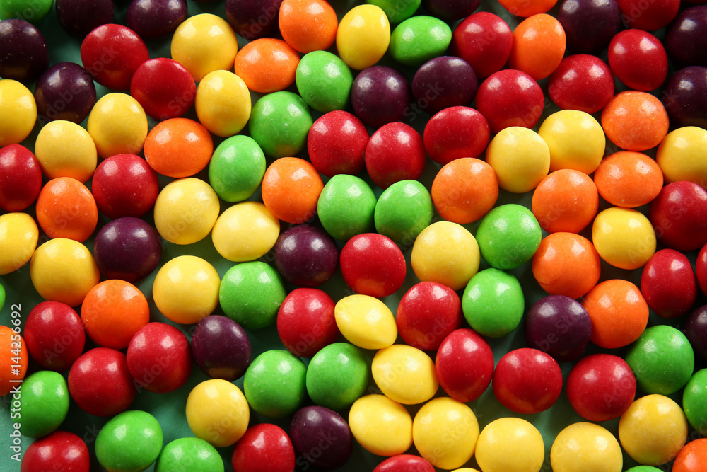 Delicious colorful candies as background Delicious colorful candies as background