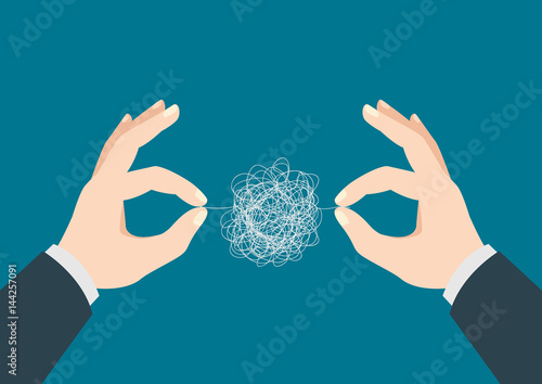 Man hands trying to untangle the tangled thread