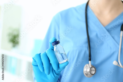 Nurse with medicine for vaccination, closeup