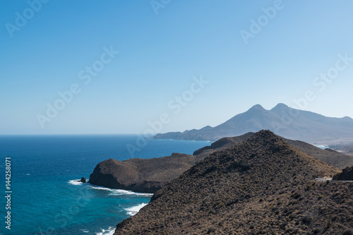 mountains by the sea coastline