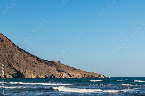 mountains by the sea coastline