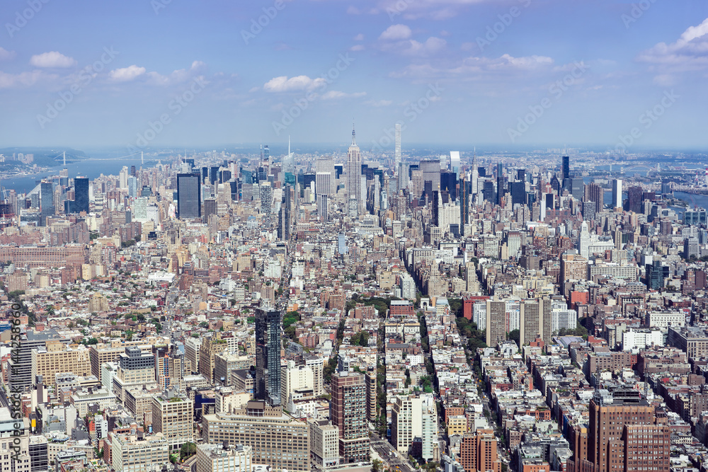 New York City Skyline View Looking North Across Manhattan  A view from the top of a skyscraper, looking north across midtown Manhattan towards Central Park and beyond.