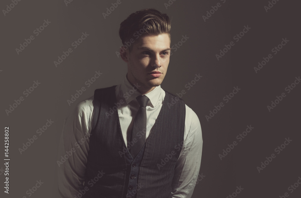 Fototapeta premium Handsome man or fashion model with stylish haircut
