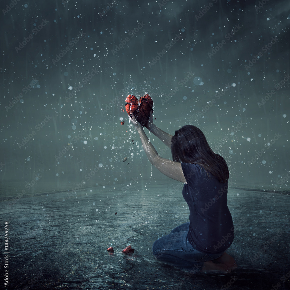 Broken heart during rain storm Stock Photo | Adobe Stock