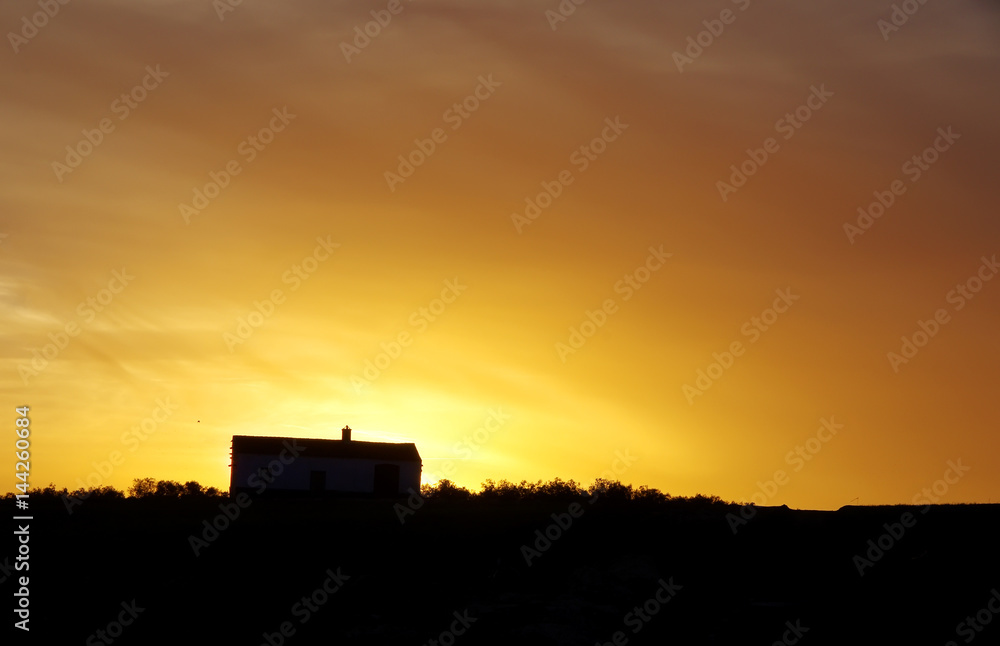 house in Alentejo region at sunset. Portugal
