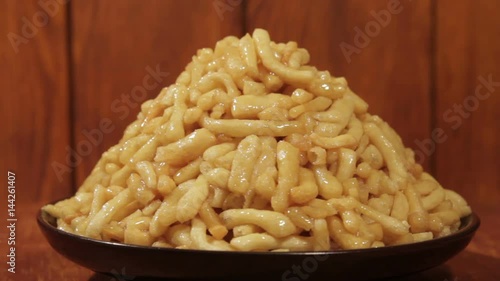 Traditional home oriental sweetness from flour with honey closeup.