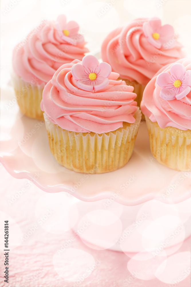 Vanilla cupcakes with pink raspberry frosting Vanilla cupcakes with pink raspberry frosting