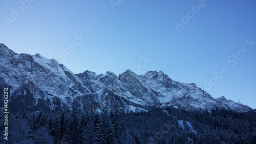 The highest point of Germany oversees many peaks of the Alps on both German and Austrian sides.