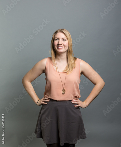 Studio portrait of a happy young woman