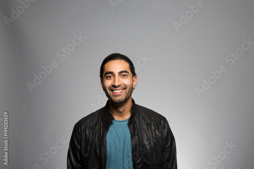 Fotografie, Obraz Studio portrait of an excited young man