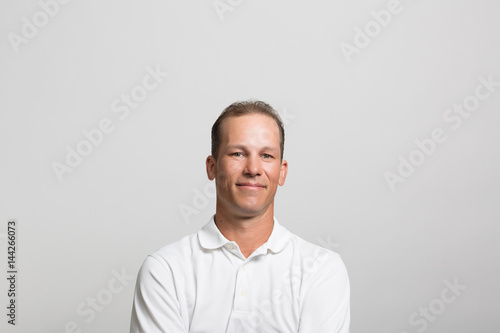 Studio portrait of a happy professional man