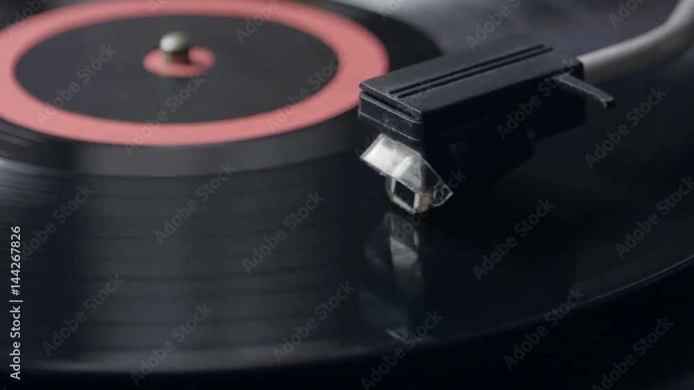 Vinyl rotating on a turntable, top view Vinyl rotating on a turntable, top view
