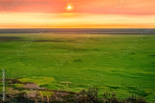 Sunset over the floodplains from Ubirr Rock - Kakadu national Park, NT, Australia.