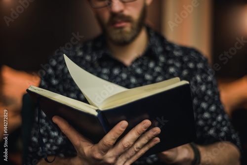 Fotografija Man reading a book