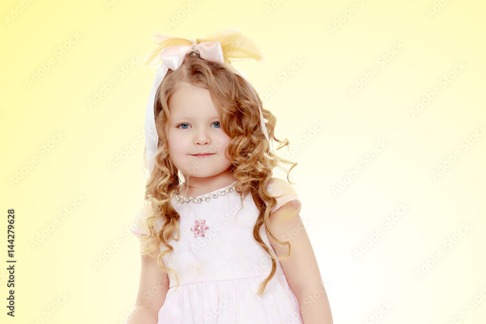 Little girl with curly hair.
