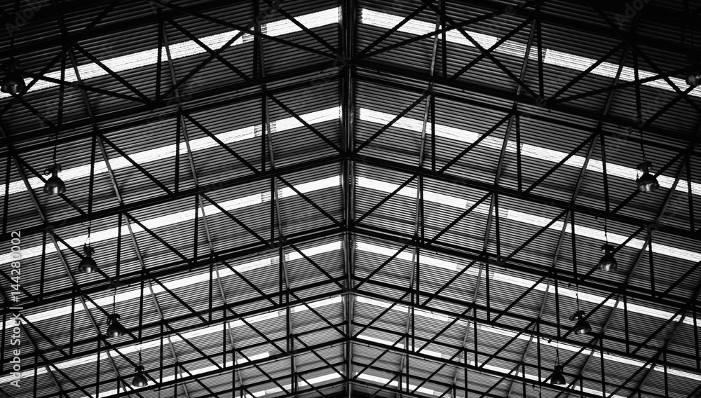 Black and white image of Steel structure roof frame for building construction. Black and white image of Steel structure roof frame for building construction.