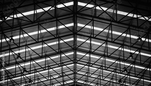 Black and white image of Steel structure roof frame for building construction.